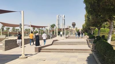 People walking in a garden in Cairo, Egypt