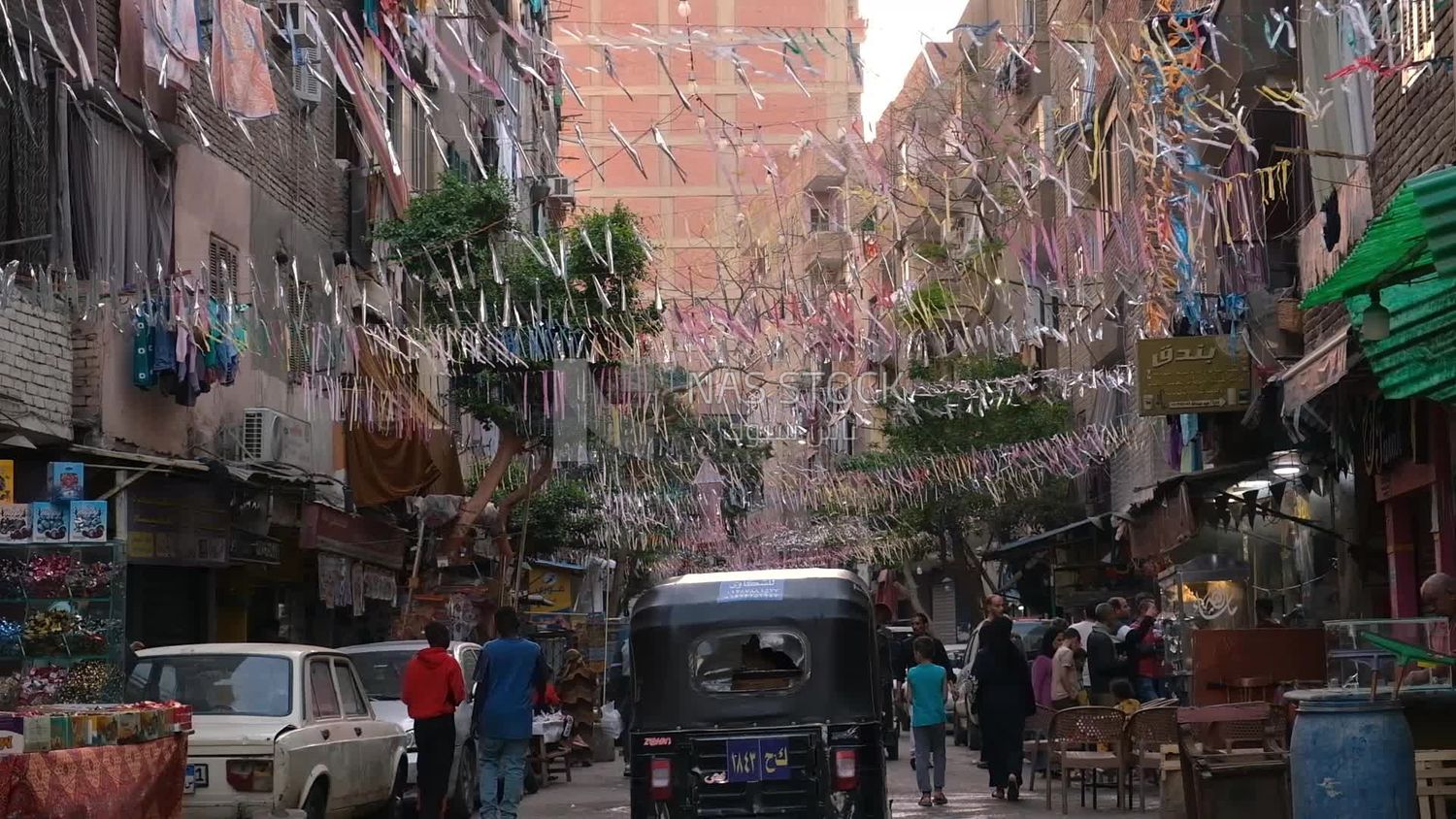People walking in the street, Ramadan Kareem