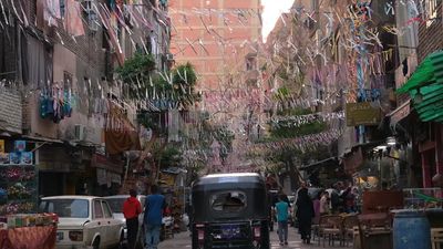 People walking in the street, Ramadan Kareem