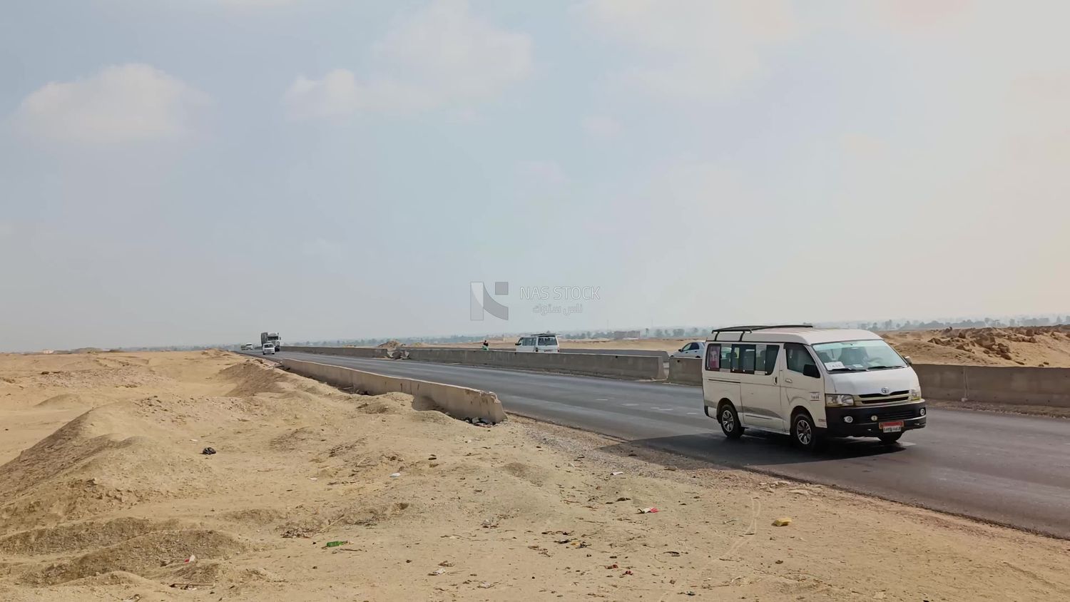 Video showing the golden yellow sands that are found on both sides of the desert road