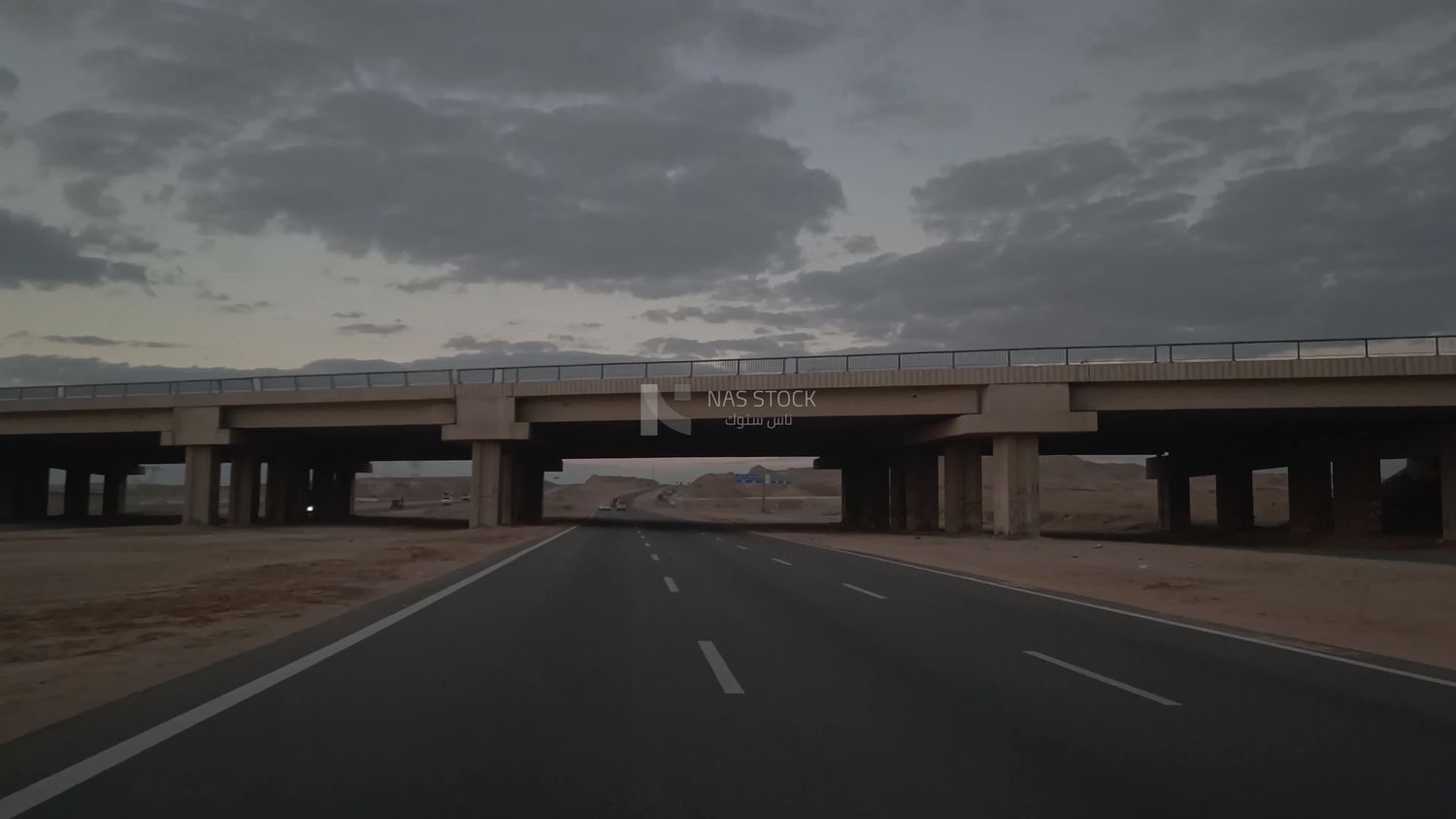 Stunning landscape video of the sky at sunset on the desert road in a magical view