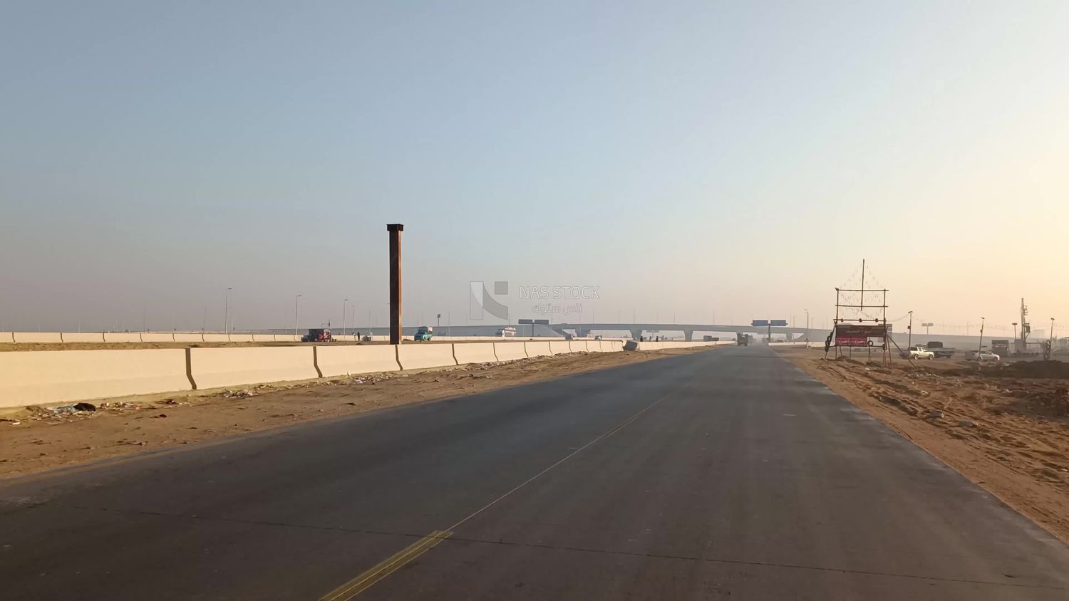 Video showing a camera inside a car traveling on a desert road