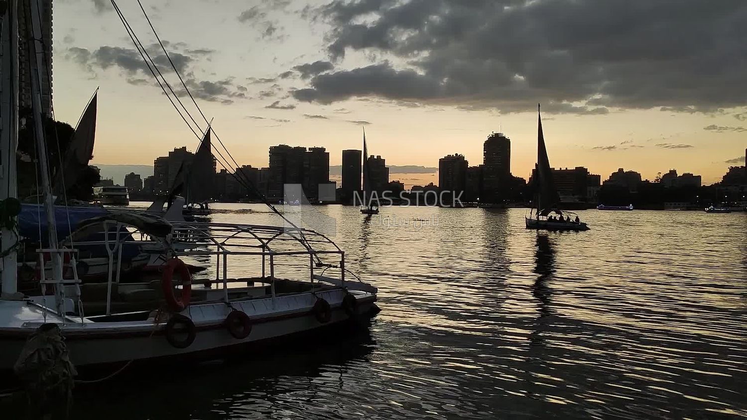 Video showing a stunning sunset view with the Nile River and Nile boats at anchor