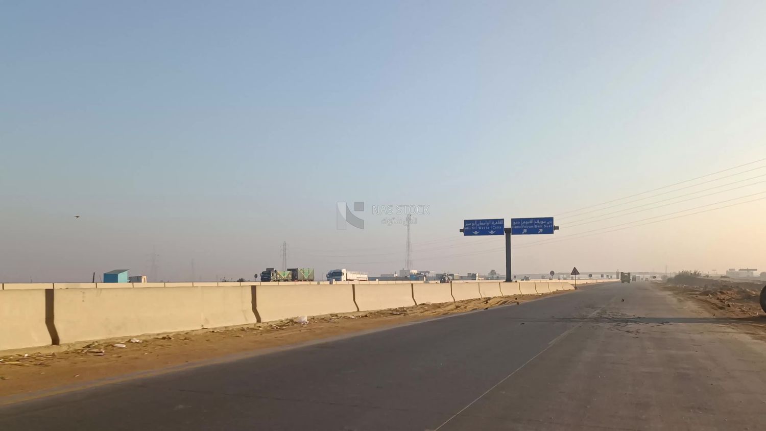 Video showing a camera inside a car traveling on a desert road