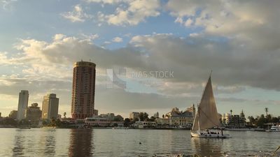 Video showing a sailboat roaming the Nile River in front of the Sofitel El Gezira Hotel and the Sheraton Hotel