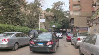 Video showing cars driving in a quiet street in the Zamalek neighborhood in Cairo