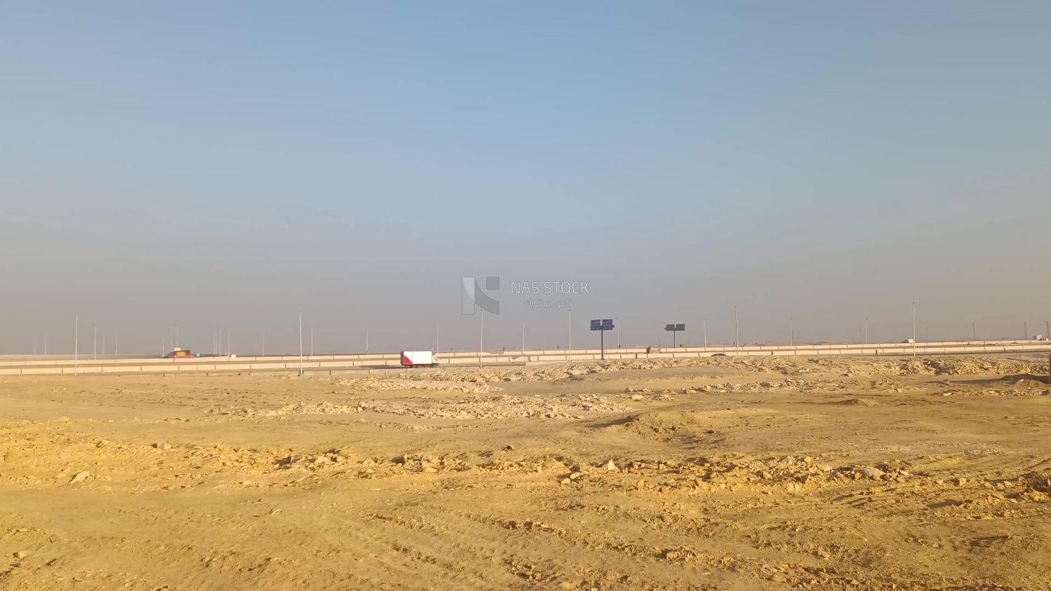 Video showing cars driving on the Egyptian desert road as it crosses the desert