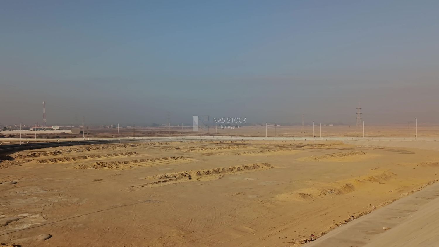 Video showing the golden yellow sands that are found on both sides of the desert road