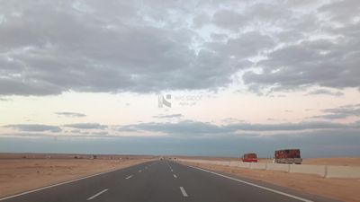 Video showing traveling on the desert road with a stunning view of the sky and clouds