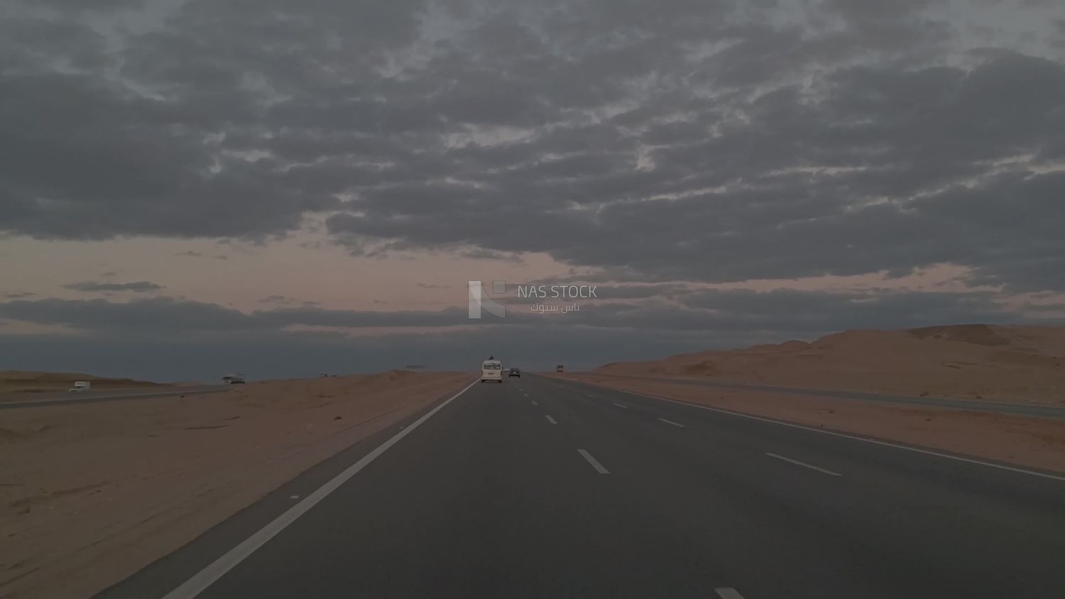 Video showing traveling on the desert road with a stunning view of the sunset