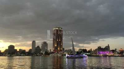 Video showing a group of sailboats cruising in the Nile River in front of the Sofitel El Gezira Hotel and Sheraton Hotel