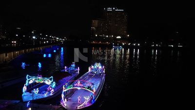 Video showing a stunning view of the Nile feluccas shining in the Nile River in front of the Semiramis Hotel