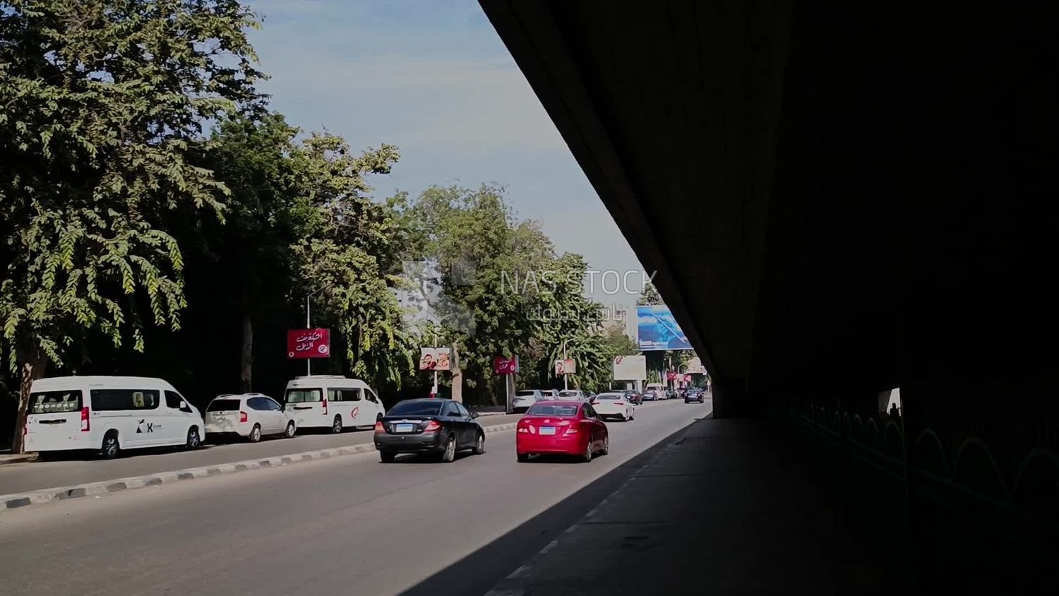 Video showing cars driving next to a bridge in Zamalek, Cairo