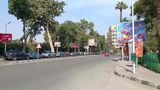 Video showing one of the wide streets of Zamalek in Cairo, where cars are moving quickly