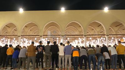 View from the back of the worshipers in the mosque, performing the obligatory prayer inside the mosque, reverence in prayer, performing the obligatory prayer in the mosque, worship and getting closer