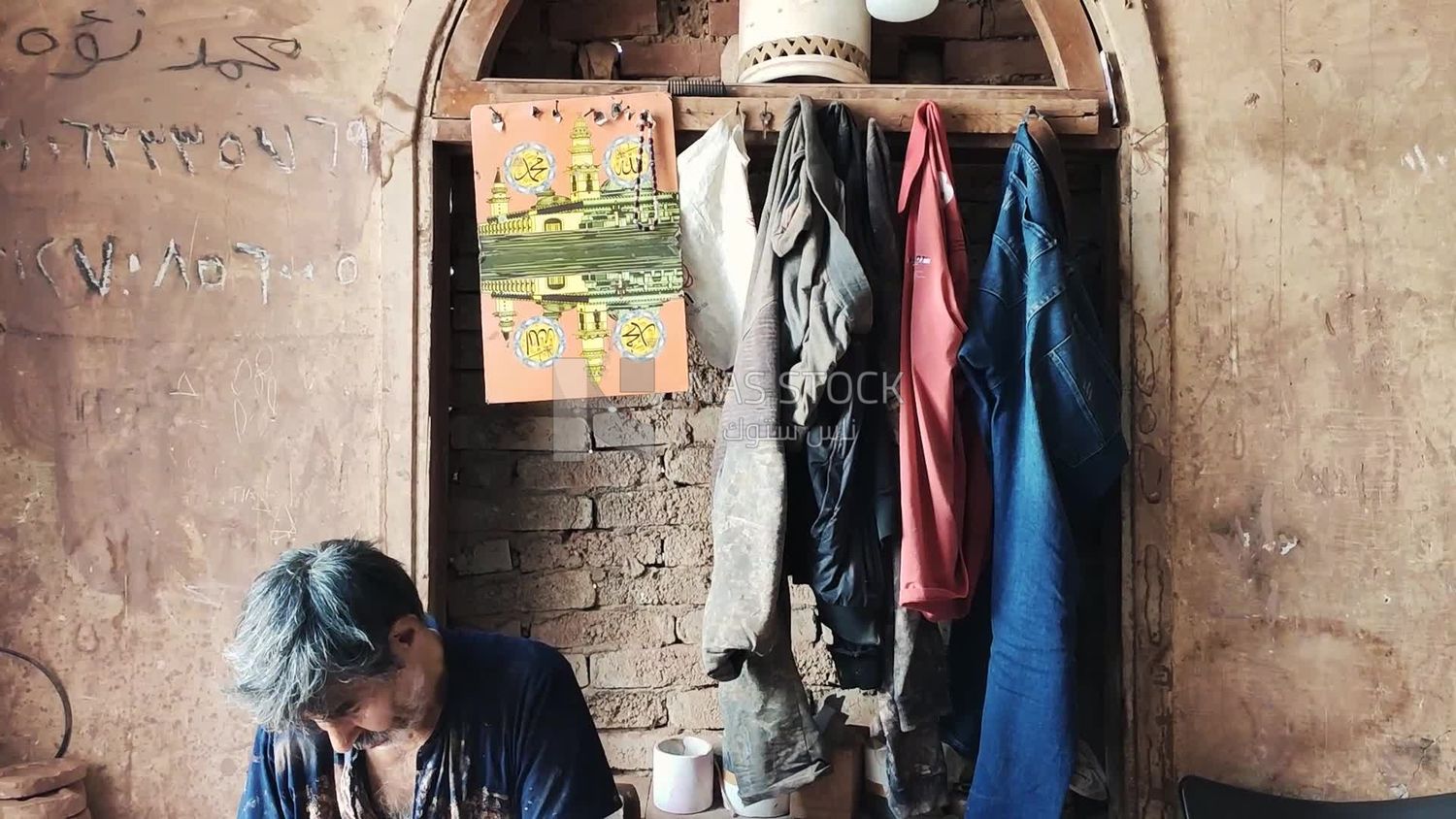 Man working in a pottery workshop