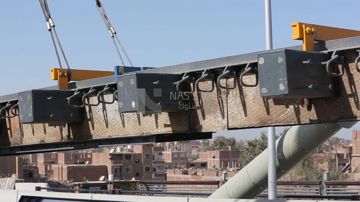 Group of engineers trying to put a part of a bridge to complete it, work, construction, engineering tools and equipment