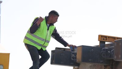 Group of engineers trying to put a part of a bridge to complete it, work, construction, engineering tools and equipment
