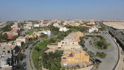 Drone footage of an overview for compounds in Zayed, Egypt