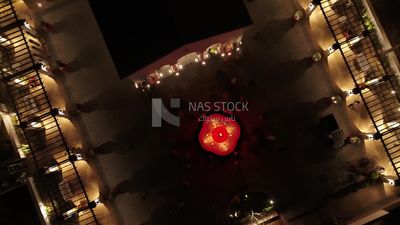 Drone video of a red glowing water fountain at a hotel in Marassi, North Coast, Egypt