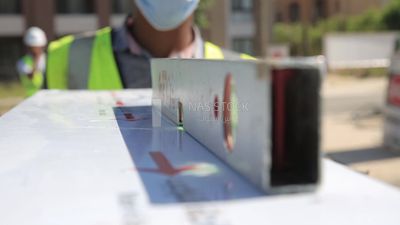 Engineer checks the building with a spirit level