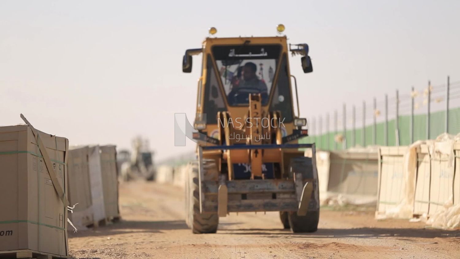 Man driving an excavator in solar energy