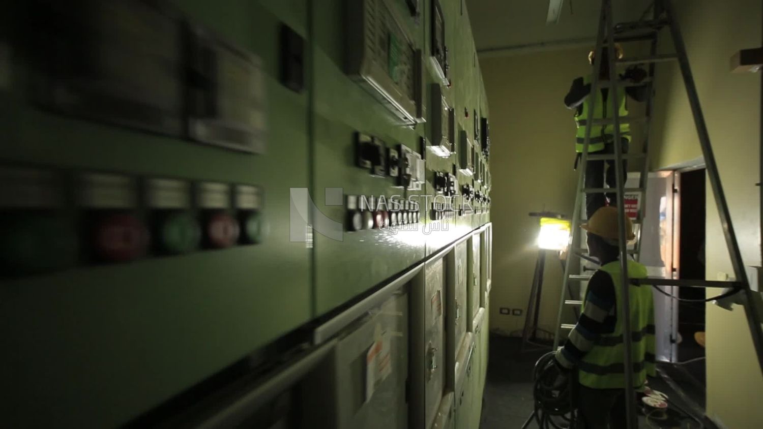 Man checking the electric wire of the ceiling