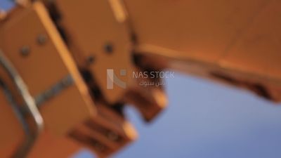 Man driving an excavator in solar energy