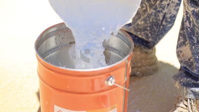 Worker puts insulation material into to Pastel to make it ready, Isolation work