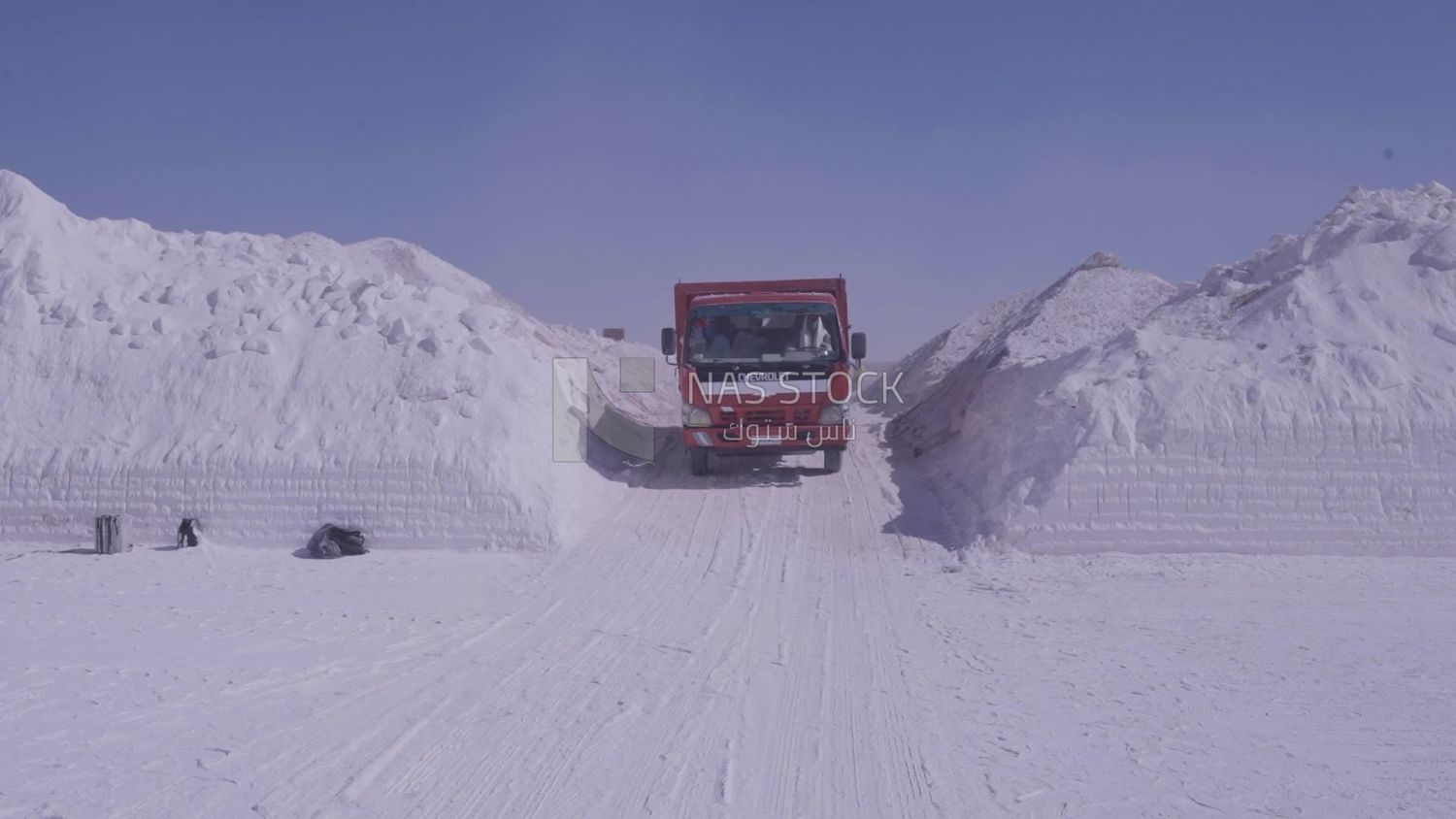 Workers riding a car after finishing the work in the quarry