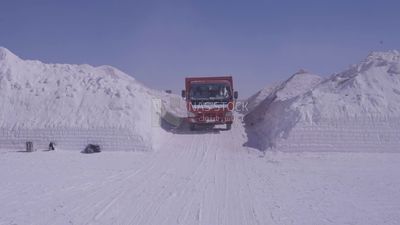 Workers riding a car after finishing the work in the quarry