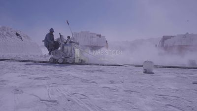 Man works on the machine  in a quarry