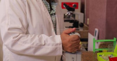 Veterinarian in the laboratory, animals