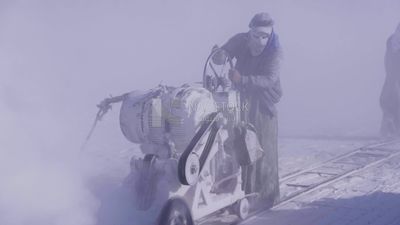 Man works on the machine  in a quarry