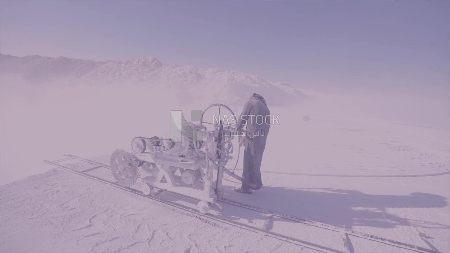 Man works on the machine  in a quarry