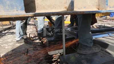Welder in special clothes goggles safety helmets, steel welding, industrial worker