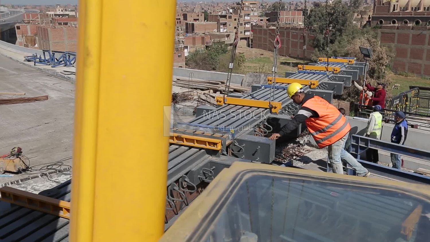 Group of engineers trying to put a part of a bridge to complete it, work, construction, engineering tools and equipment
