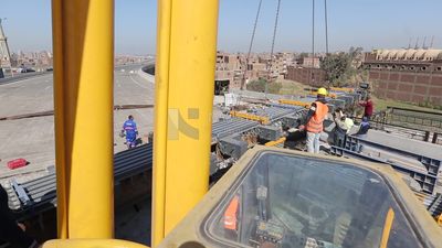 Group of engineers trying to put a part of a bridge to complete it, work, construction, engineering tools and equipment