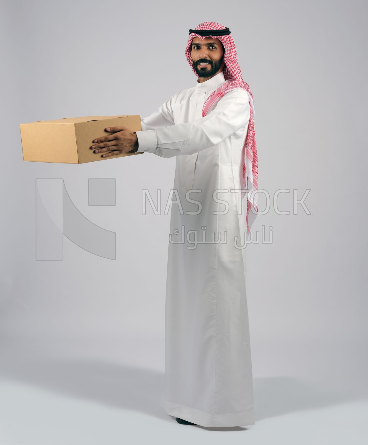 Gulf man carrying a box