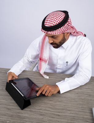 Gulf man using a tablet