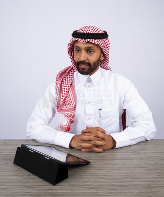 Gulf man in a meeting