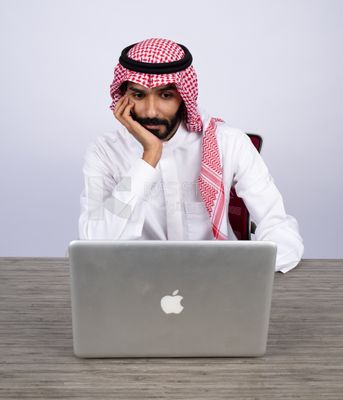 Gulf man using laptop