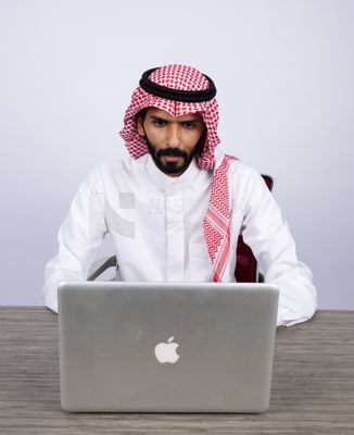Gulf man using laptop