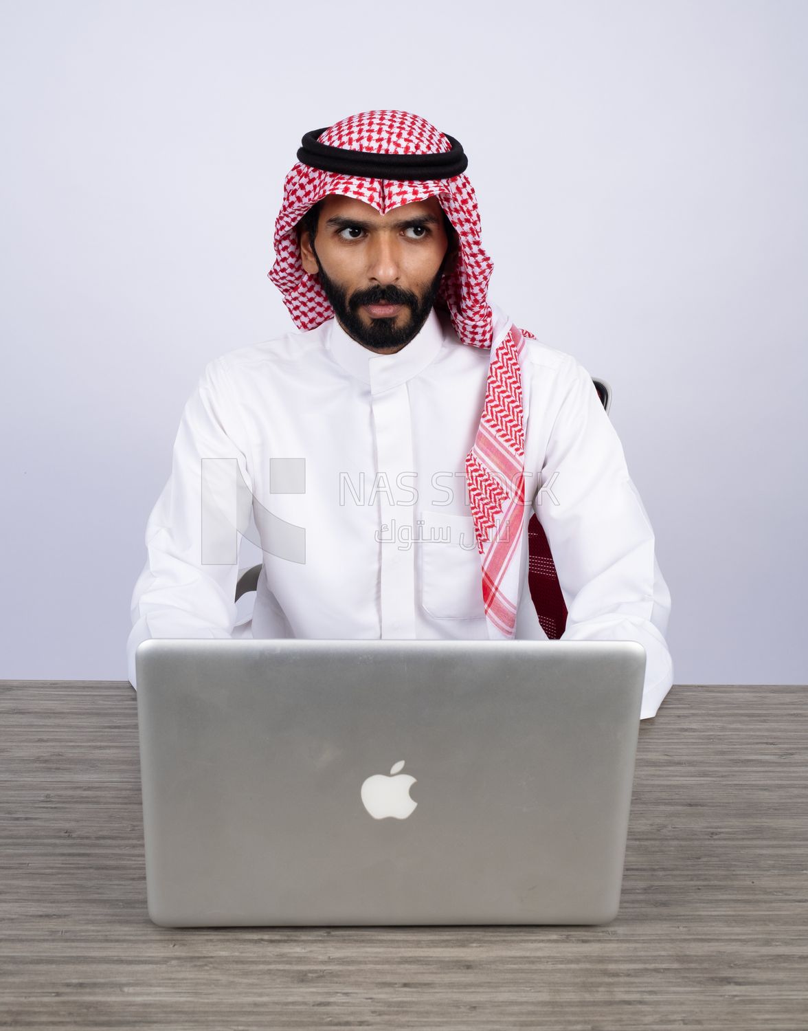 Gulf man using laptop