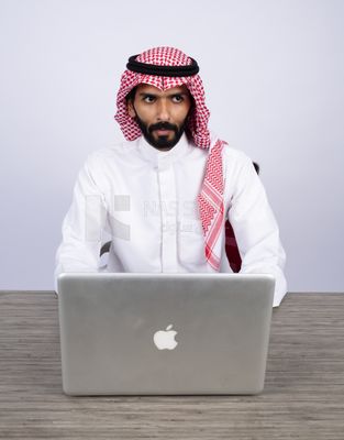 Gulf man using laptop