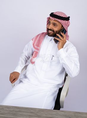 Gulf man talking on phone