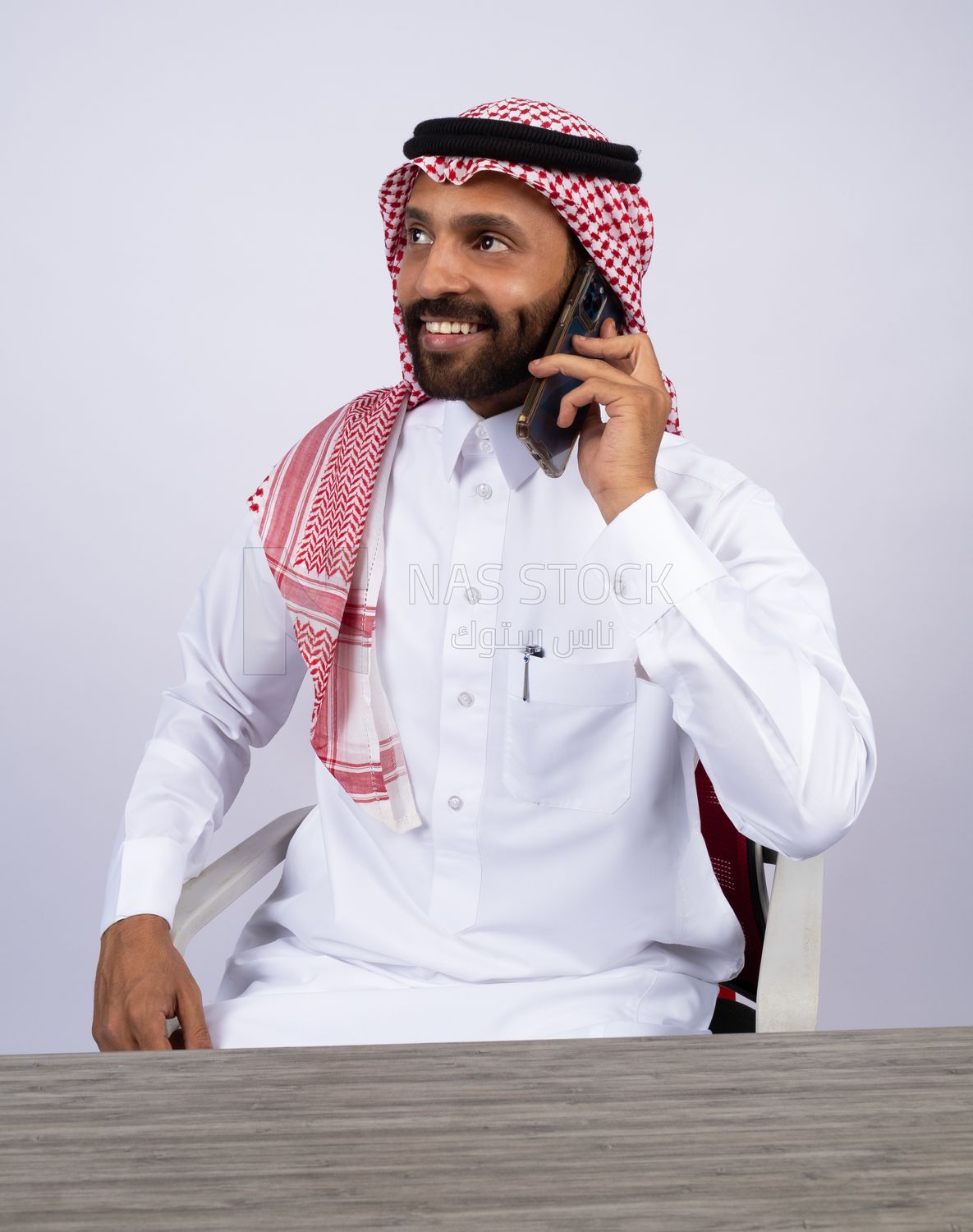 Gulf man talking on phone