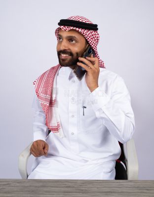 Gulf man talking on phone