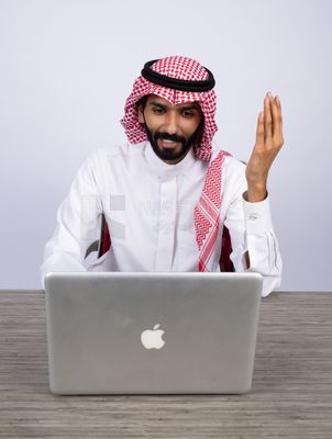 Gulf man using laptop