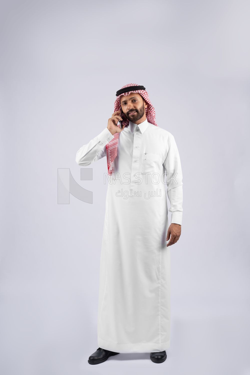 Gulf man talking on the phone
